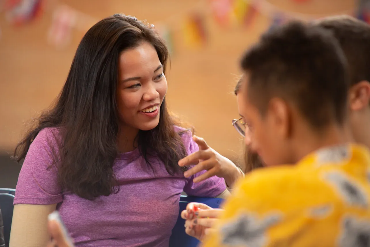 TUS International student speak with friends.