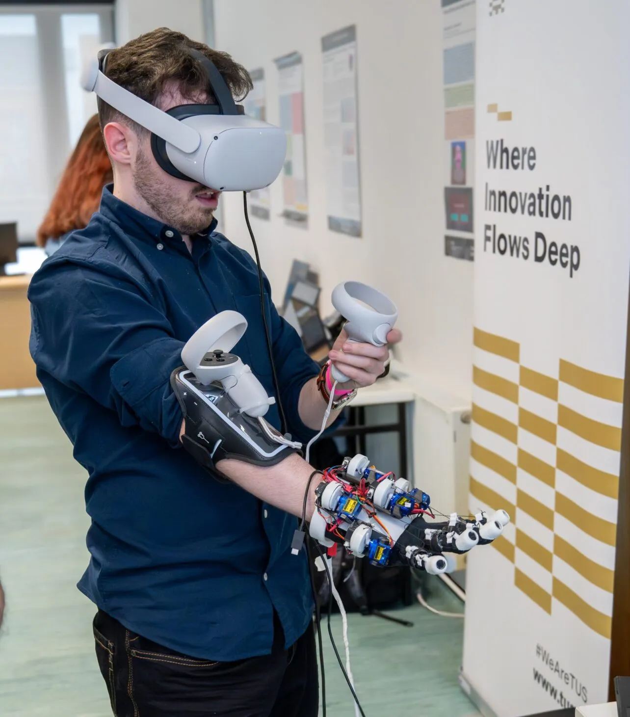 Final-year BSc (Hons) Software Design with Virtual Reality and Gaming student Aaron McEvoy from Mountmellick, Co. Laois, received the Overall Winner for Computer and Software Engineering award at the TUS Engineering Expo 2024 for the development of a low-cost haptic feedback virtual reality glove. Photo: Conor Keighrey